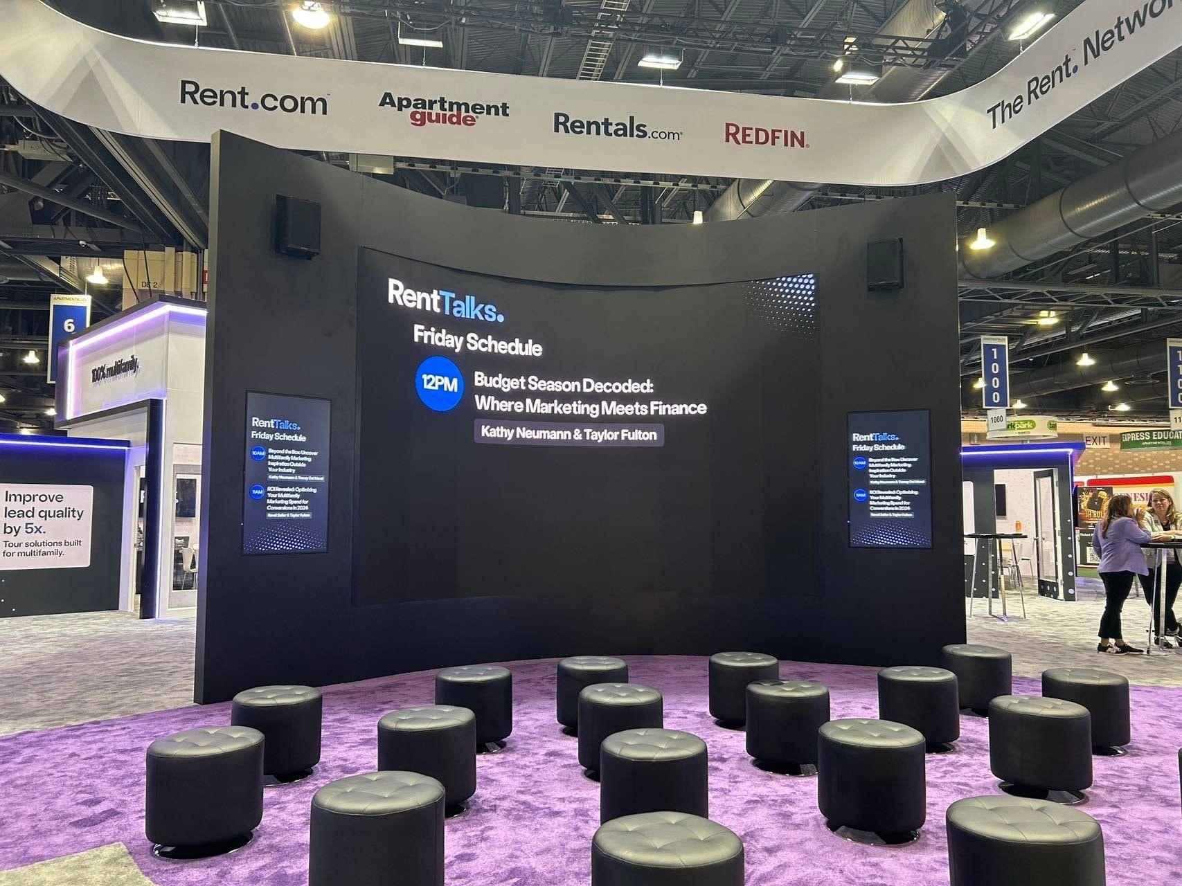 Curved LED video wall lighting a corporate exhibit lounge
