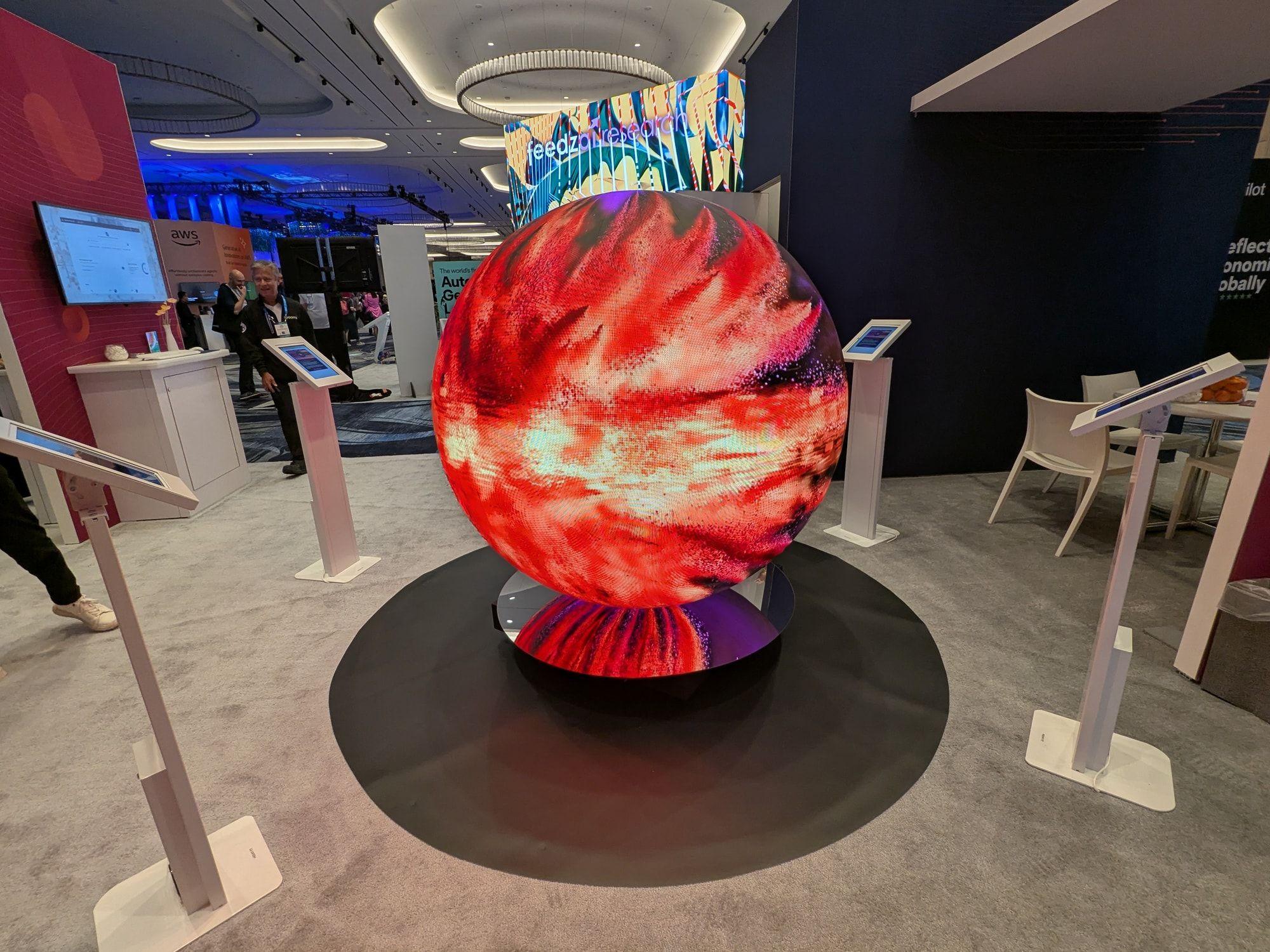 Red-lit 360 LED sphere as the centerpiece of an exhibit activation