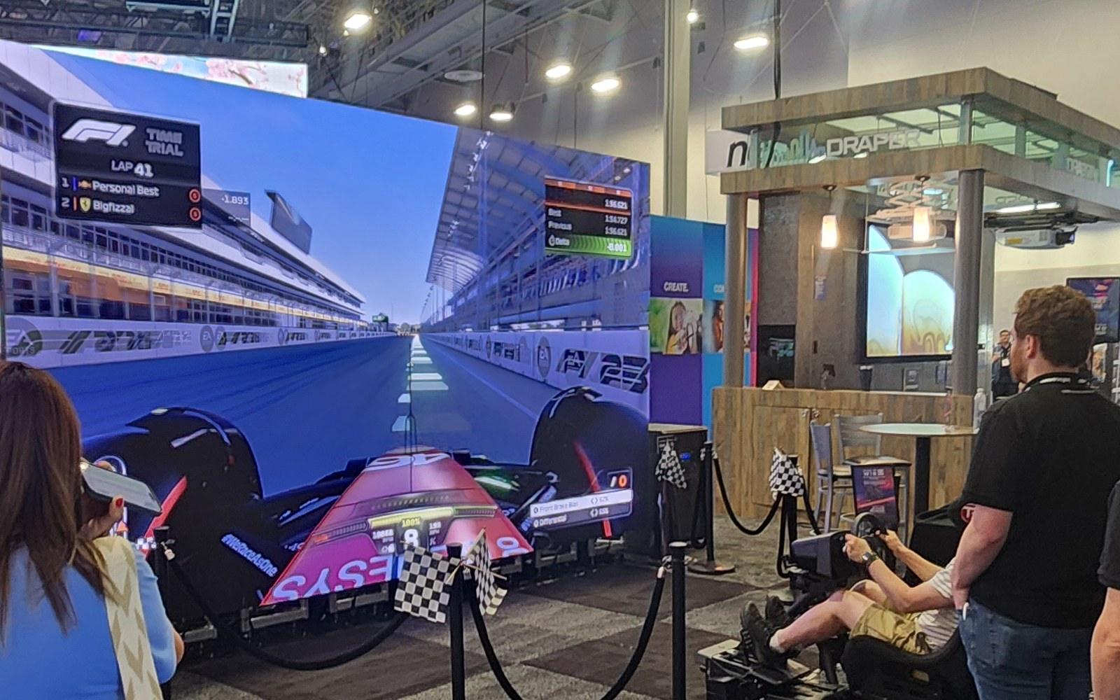 Racing-simulator LED wall on a trade-show floor