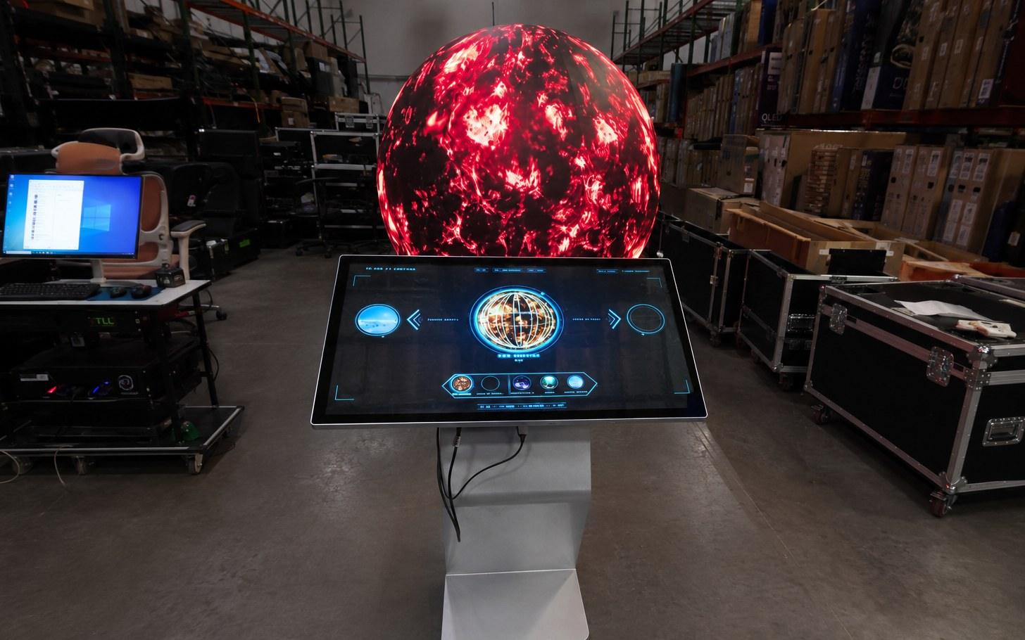Touchscreen-controlled sphere on a trade-show floor