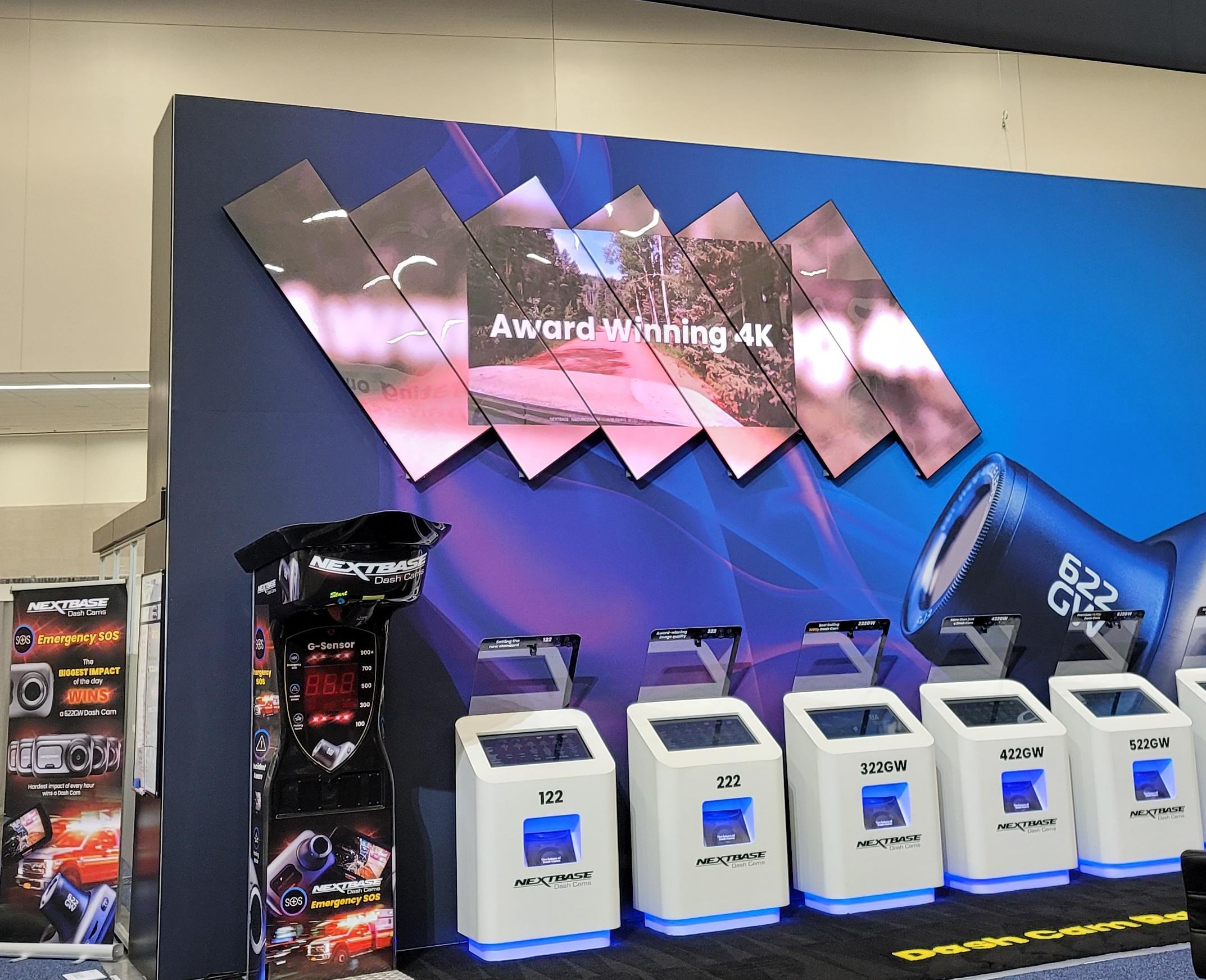 A ground-supported LED video wall on a trade-show floor