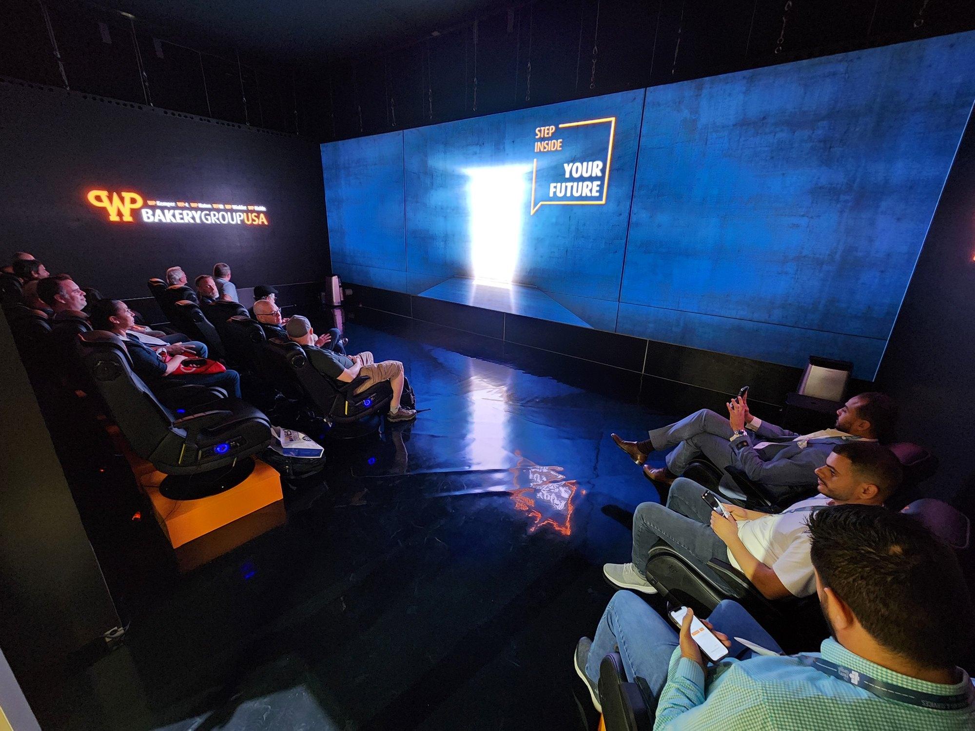 The LED Theatre: A seated room wrapped in LED. We build the theatre, drive the screen, and run a repeatable showing on schedule.